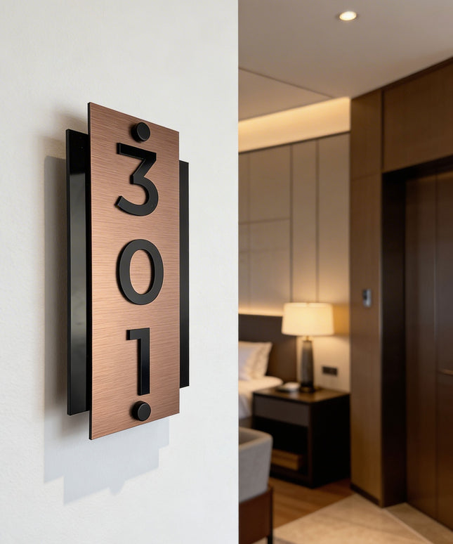ALUMADESIGNCO vertical brushed bronze standoff hotel room number sign with raised black acrylic numbers, modern door signage for boutique hotels and apartment interiors