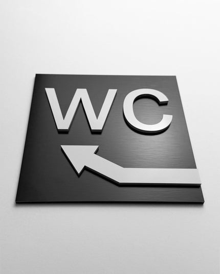 WC arrow upstairs sign by ALUMADESIGNCO, stylish toilet direction plaque for hotels, offices, restaurants, and public interior spaces