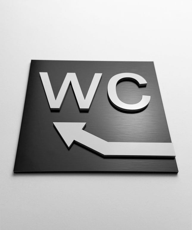 WC arrow upstairs sign by ALUMADESIGNCO, stylish toilet direction plaque for hotels, offices, restaurants, and public interior spaces