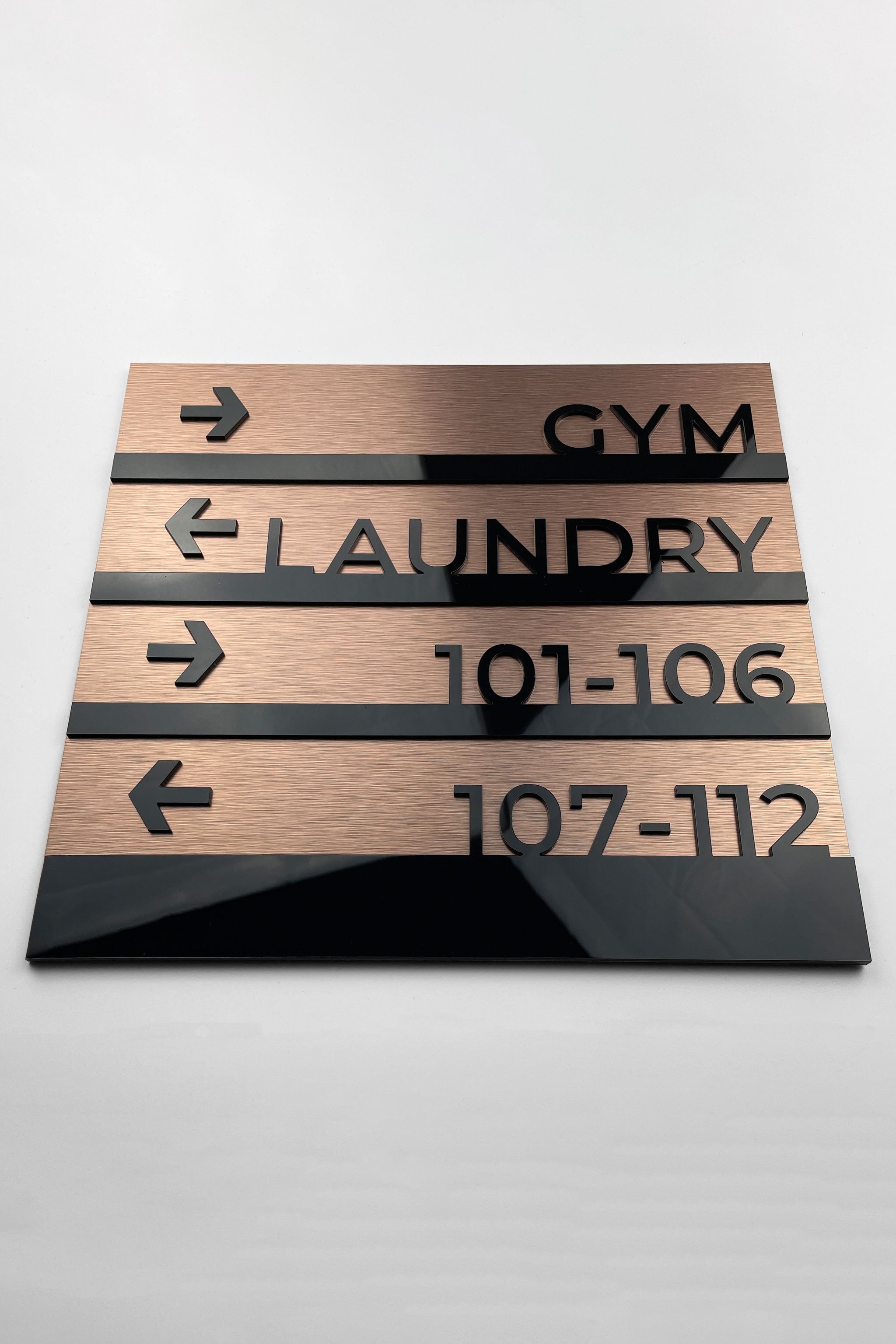 Premium wayfinding wall plaque in Bronze Modern design by ALUMADESIGNCO, stylish directional signage for offices, hotels, corridors, and modern interior spaces
