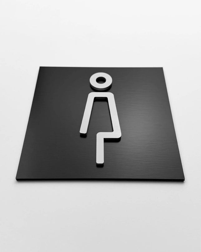 Schwarzes Damentoiletten-Schild mit weißem Frauensymbol