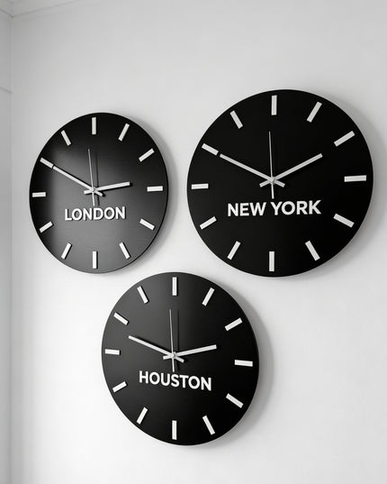Modern personalized world time zone clock by ALUMADESIGNCO with brushed black panel and white acrylic glass city names, stylish wall décor for offices and hospitality spaces