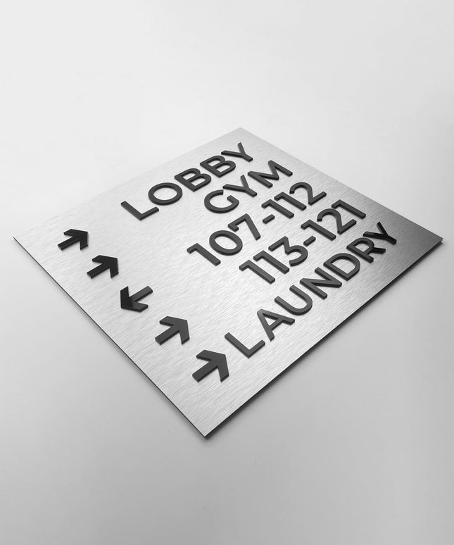 Modern Bronze wayfinding sign by ALUMADESIGNCO featuring premium wall plaque design, elegant directional signage for hotels, offices, and contemporary interiors