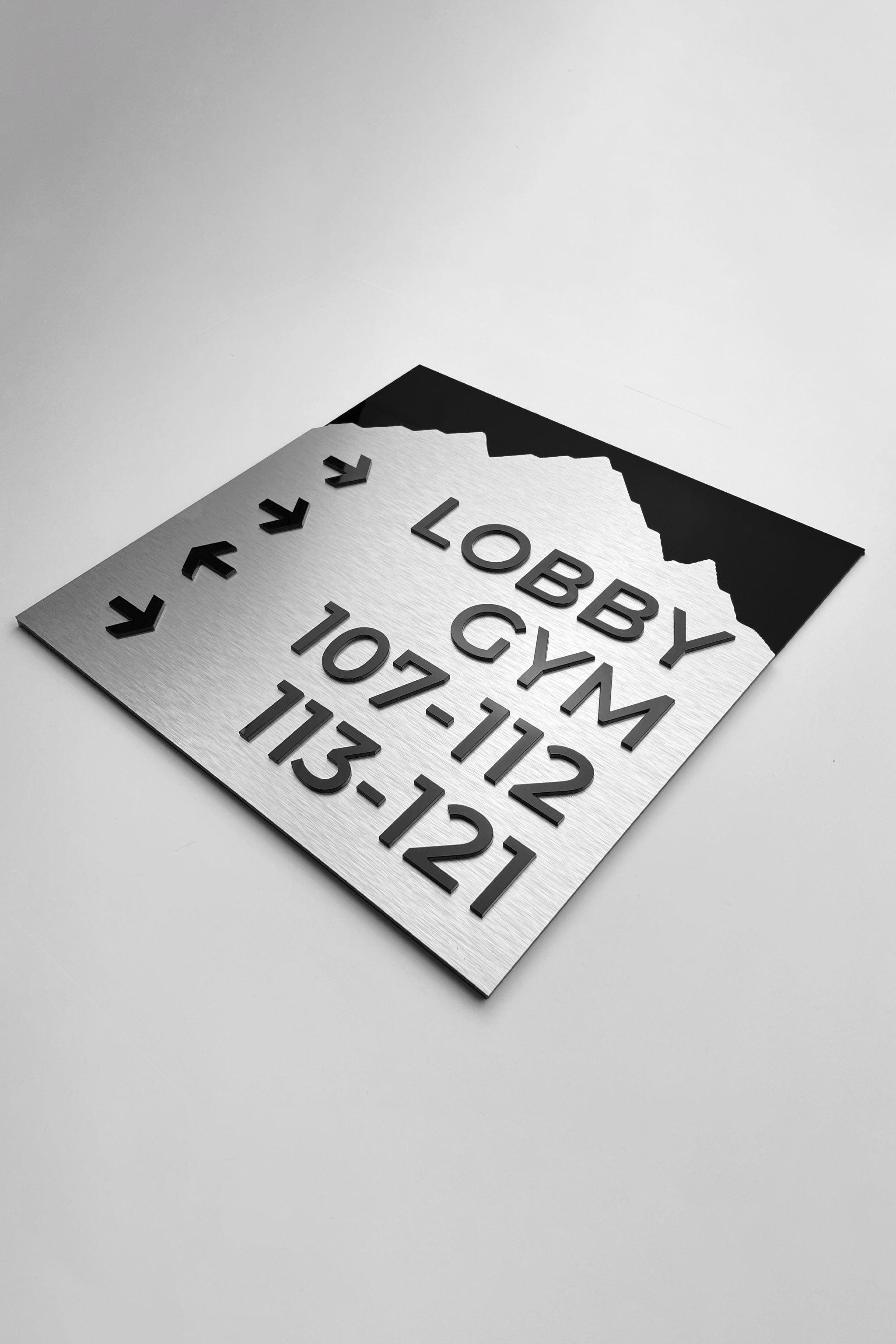 Modern Mountain Design wayfinding wall sign by ALUMADESIGNCO featuring aluminium plate construction, elegant directional signage for hotels, offices, and contemporary interiors