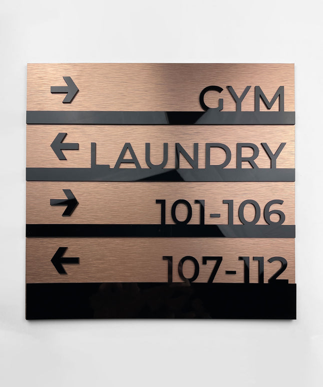 Modern Bronze wayfinding sign by ALUMADESIGNCO featuring premium wall plaque design, elegant directional signage for hotels, offices, and contemporary interiors