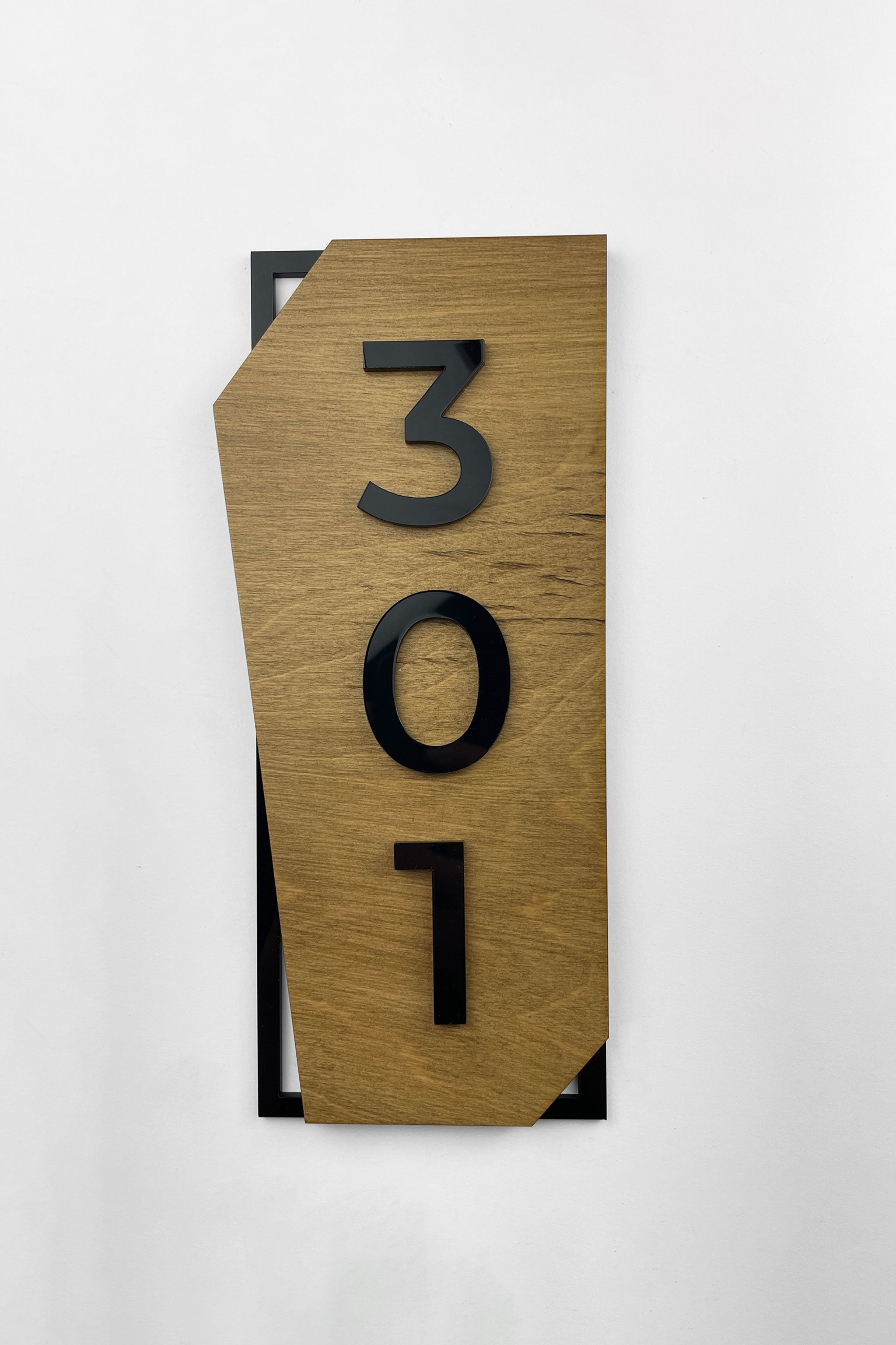 Modern vertical hotel room number sign by ALUMADESIGNCO featuring wood and acrylic construction, stylish door plaque designed for hotels, offices, and apartment corridors