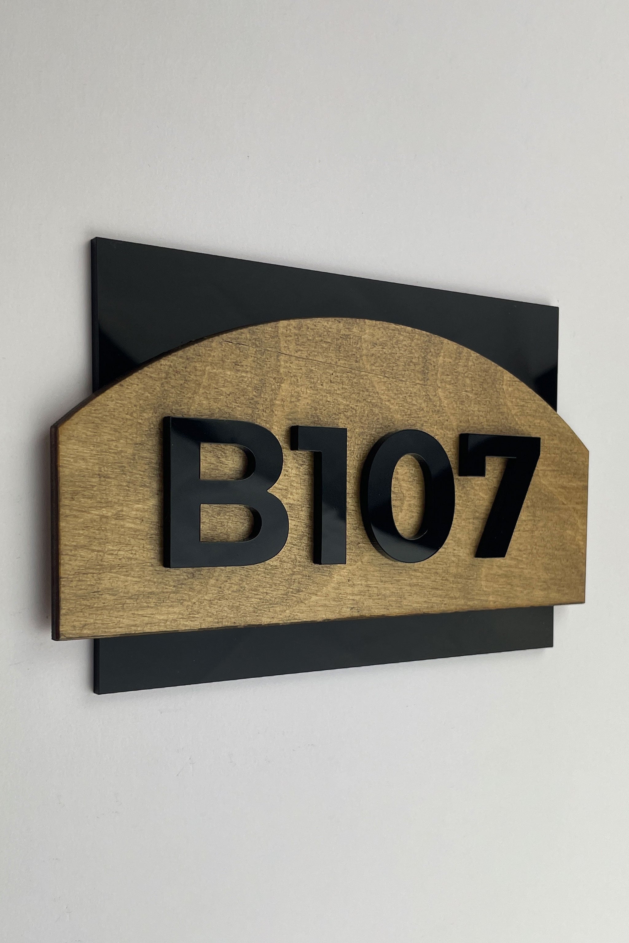ALUMADESIGNCO modern hotel room number sign made from wood and acrylic with raised black numbers, minimalist door number plaque for hotel corridors and apartments