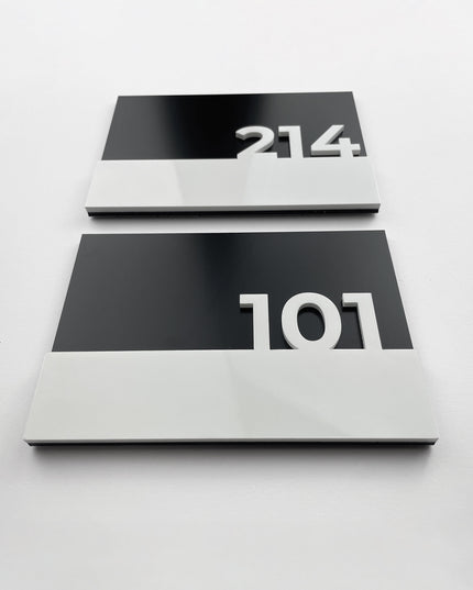Elegant black door number sign Horizon Design by ALUMADESIGNCO featuring minimalist modern style and acrylic numbers, premium signage for hotel rooms and apartment interiors