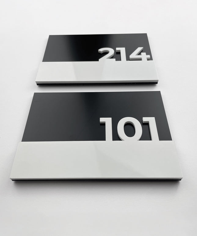 Elegant black door number sign Horizon Design by ALUMADESIGNCO featuring minimalist modern style and acrylic numbers, premium signage for hotel rooms and apartment interiors