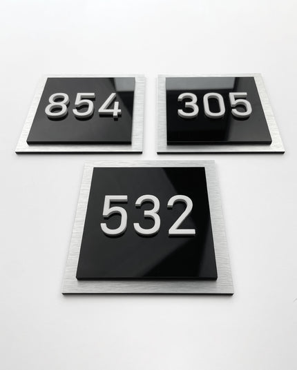 3D layered apartment door number by ALUMADESIGNCO featuring wood and acrylic layers, modern hotel style door plaque for apartments and contemporary interiors