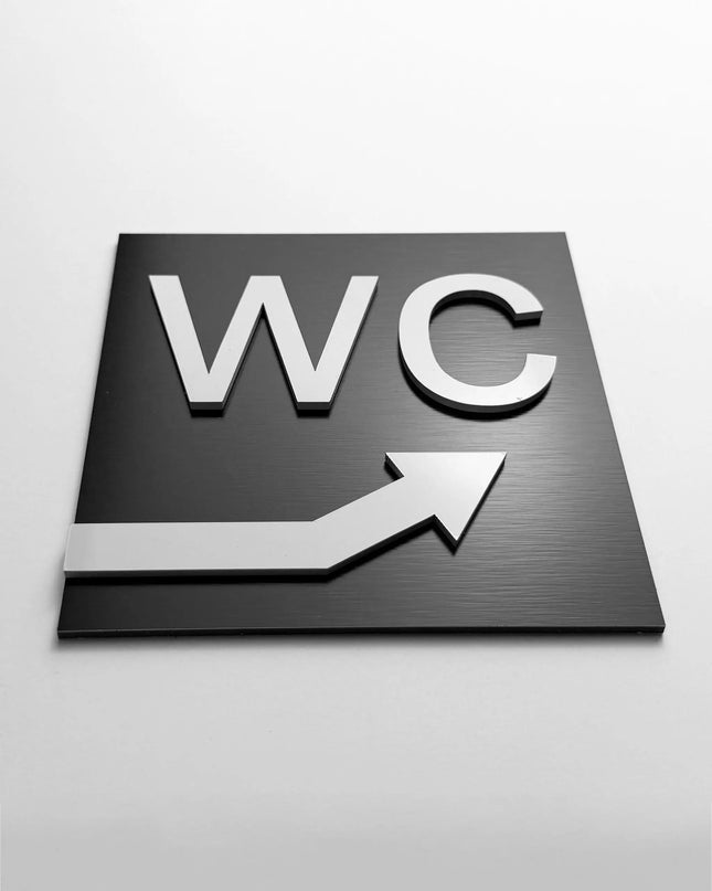 WC arrow upstairs sign by ALUMADESIGNCO, modern toilet direction plaque for hotels, offices, restaurants, and public interior spaces