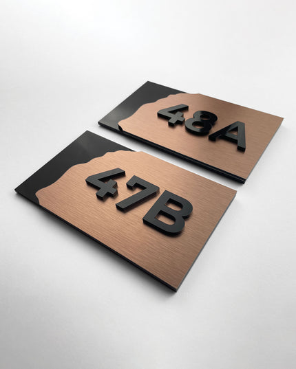 ALUMADESIGNCO Fusion room number plaque with minimalist modern design, stylish signage for hotels, Airbnb properties, and residential interiors