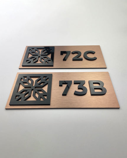 Premium brushed bronze hotel room number sign Mosaic Design by ALUMADESIGNCO featuring metal plaque and acrylic numbers, elegant door signage for hotel corridors and apartments