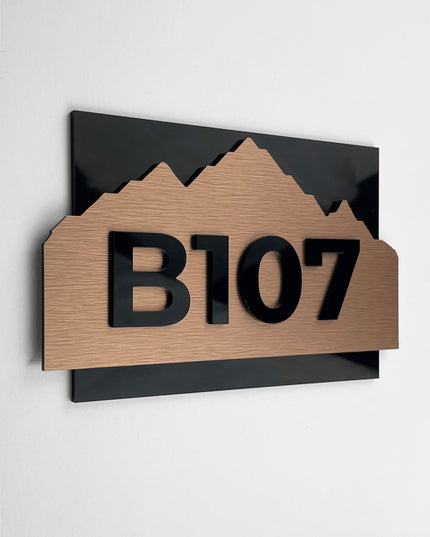 ALUMADESIGNCO Alpine Design modern brushed bronze room number sign with raised acrylic numbers, premium door signage for hotels, apartments, Airbnb properties, and offices