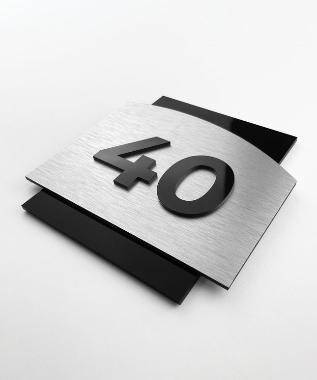 Modern 3D interior room number sign by ALUMADESIGNCO featuring raised acrylic numbers, stylish door signage for hotels, apartments, and contemporary interiors