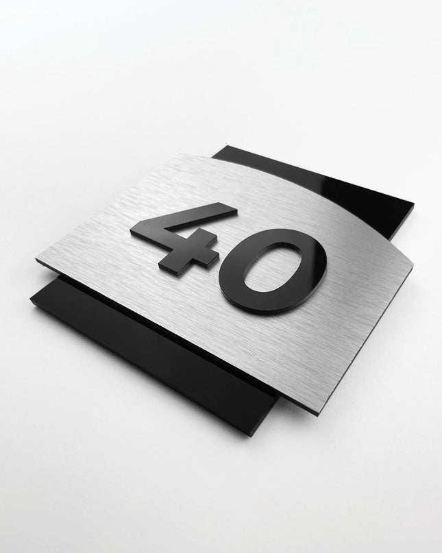 Modern 3D interior room number sign by ALUMADESIGNCO featuring raised acrylic numbers, stylish door signage for hotels, apartments, and contemporary interiors
