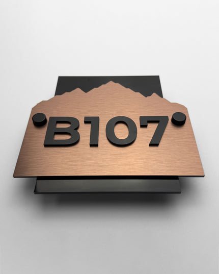 ALUMADESIGNCO Alpine Design standoff wall number sign made from brushed bronze metal and acrylic numbers for boutique hotels and luxury apartments