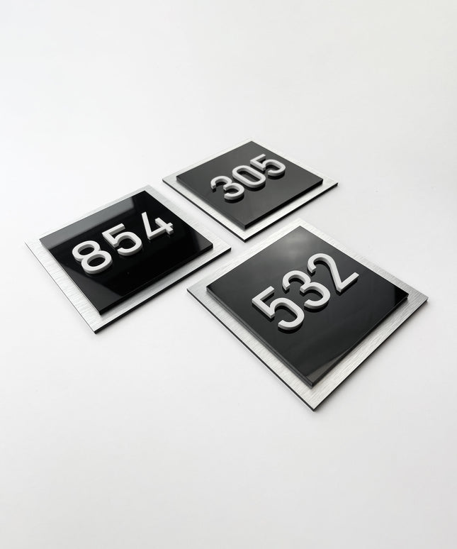 ALUMADESIGNCO layered apartment door number sign with 3D acrylic numbers, premium hotel signage for residential buildings and hospitality interiors