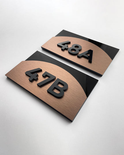 Bronze apartment door number sign with layered acrylic numbers Flow Style by ALUMADESIGNCO, modern door signage for residential and commercial interiors