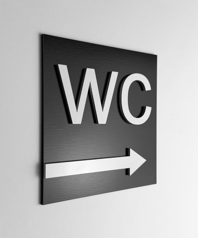 ALUMADESIGNCO WC arrow right sign with modern directional design, premium restroom wayfinding signage for offices, hotels, cafés, and commercial interiors