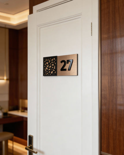 Modern designer door number sign by ALUMADESIGNCO combining brushed bronze metal panel and acrylic glass numbers, stylish signage for contemporary interiors