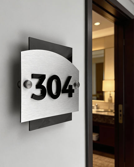 ALUMADESIGNCO Flow Design brushed silver hotel room number sign with raised 3D black acrylic numbers, modern door number plaque for boutique hotels and apartment interiors