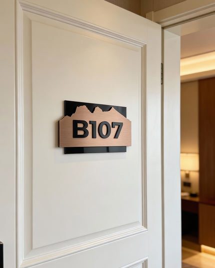 Modern Alpine Design custom hotel room number plaque by ALUMADESIGNCO combining wood base and acrylic numbers, stylish door signage for hotels and apartments