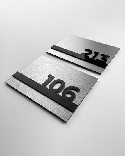 Premium Horizon Design hotel room number sign by ALUMADESIGNCO featuring brushed silver aluminum base and black acrylic glass numbers, elegant door plaque for boutique hotels