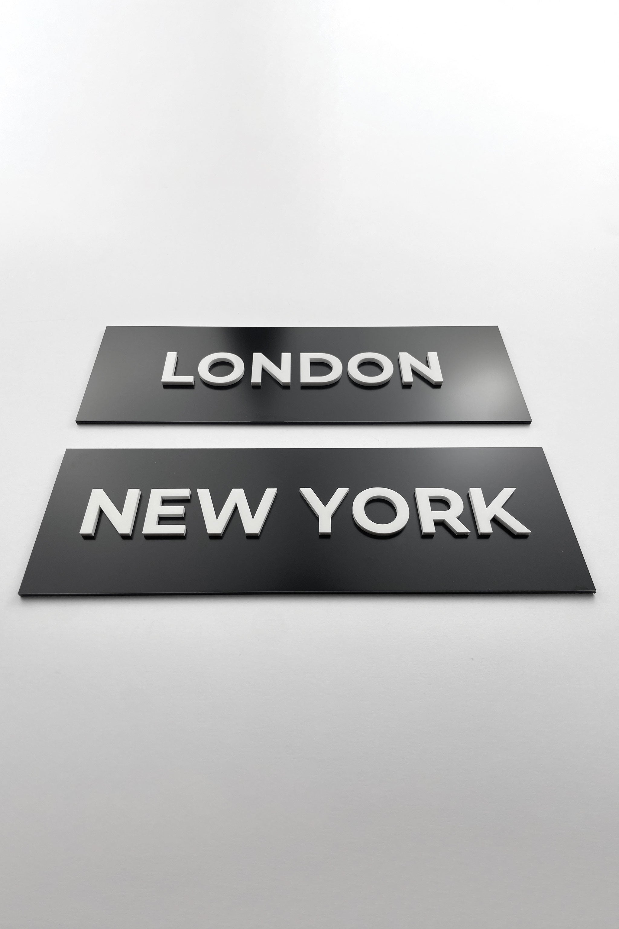 ALUMADESIGNCO custom black and white acrylic door sign with minimalist modern design, premium signage for offices, hotels, workspaces, and apartments