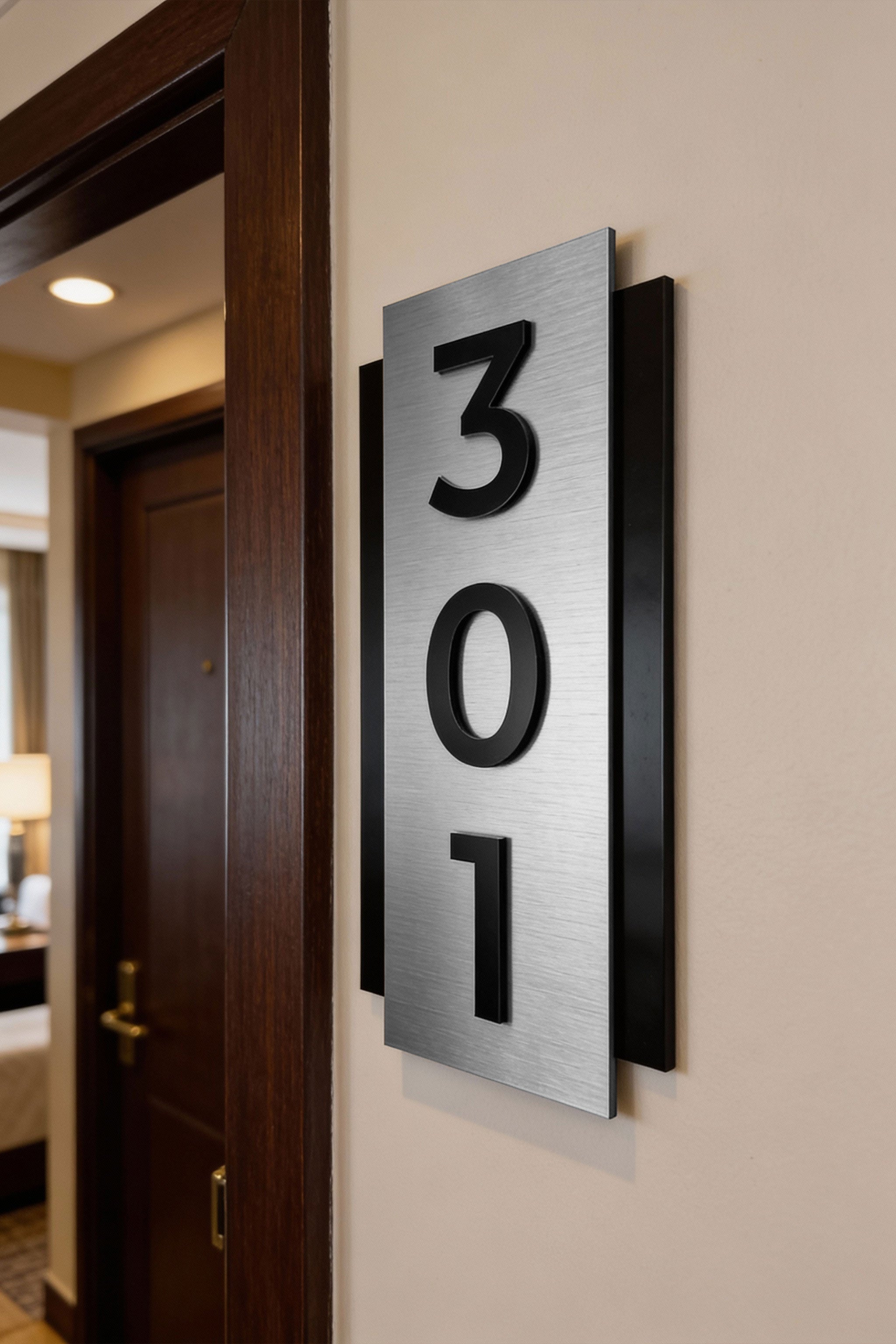 ALUMADESIGNCO vertical brushed silver room number plaque with raised acrylic numbers, modern door signage for boutique hotels and residential interiors