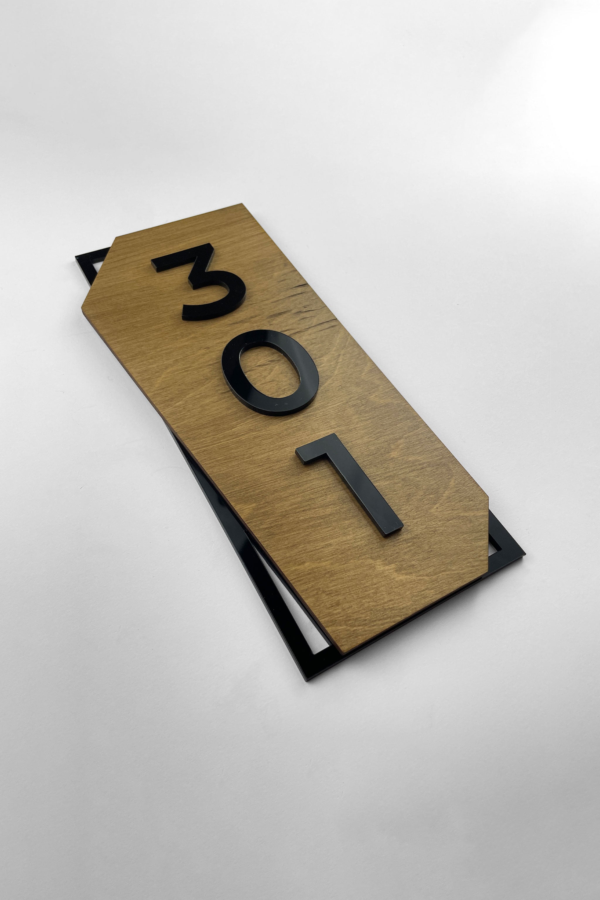 ALUMADESIGNCO classic vertical hotel door number plaque with birch plywood base and raised black acrylic characters, modern wood and acrylic signage for hospitality interiors