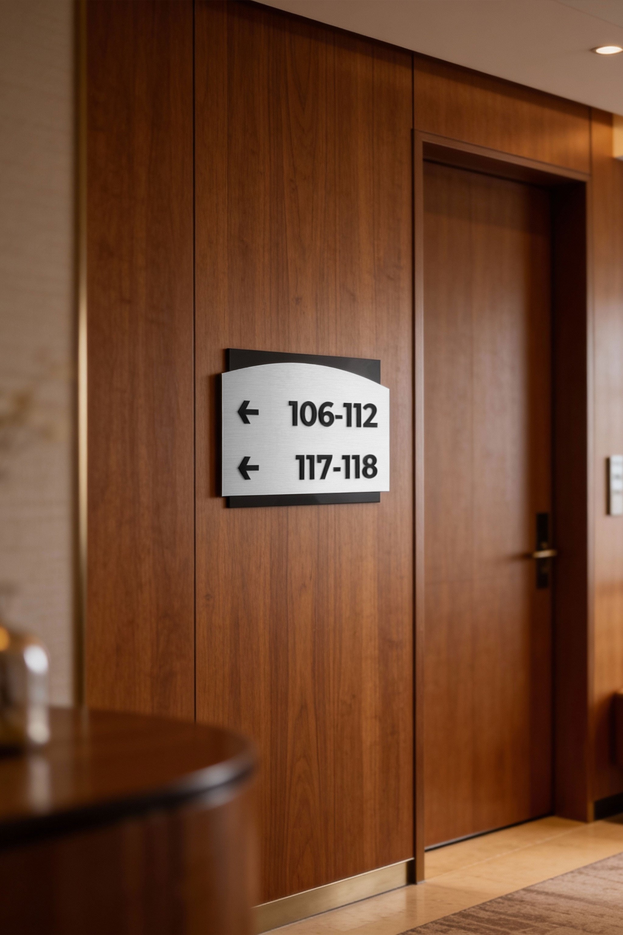 ALUMADESIGNCO Flow Design directional wayfinding sign with modern acrylic text, premium signage for offices, hotels, apartments, and contemporary interior spaces