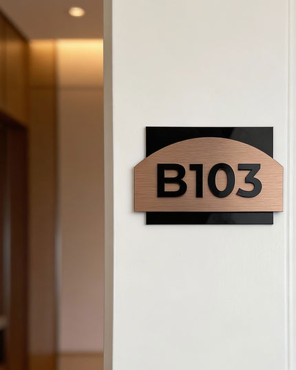 Modern Flow Design apartment door number plaque by ALUMADESIGNCO combining layered materials and acrylic numbers, stylish door signage for apartments and hotels