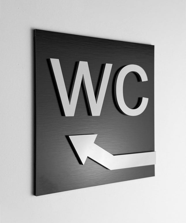 ALUMADESIGNCO WC arrow upstairs sign with modern directional design, premium restroom wayfinding signage for offices, hotels, cafés, and commercial interiors