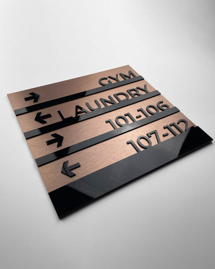 Premium Bronze Modern directional wall sign by ALUMADESIGNCO, stylish wayfinding signage for lobbies, hallways, offices, and hospitality interiors