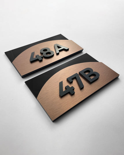 ALUMADESIGNCO Flow bronze layered acrylic apartment door number sign with raised elements, premium signage for condos, apartments, and offices