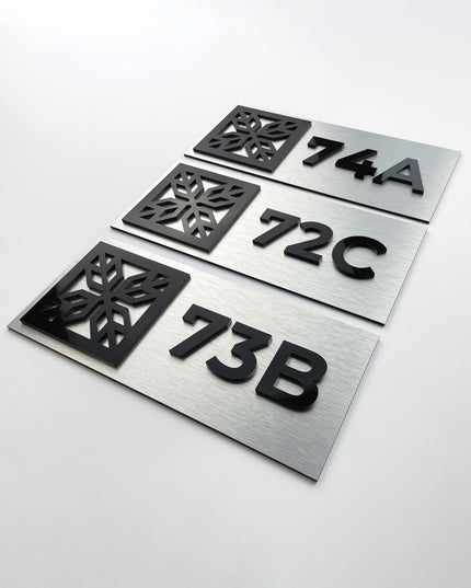Modern brushed silver and acrylic glass suite room number sign by ALUMADESIGNCO, elegant door plaque for hotel suites and apartment interiors