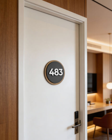 Premium Round Design room number sign by ALUMADESIGNCO combining birch plywood and black acrylic numbers, modern door plaque for hotel corridors and apartment interiors