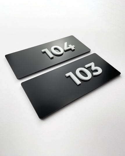 ALUMADESIGNCO black metal and white acrylic custom suite number sign with elegant modern style, stylish door signage for hotel suites, apartments, Airbnb properties, and offices