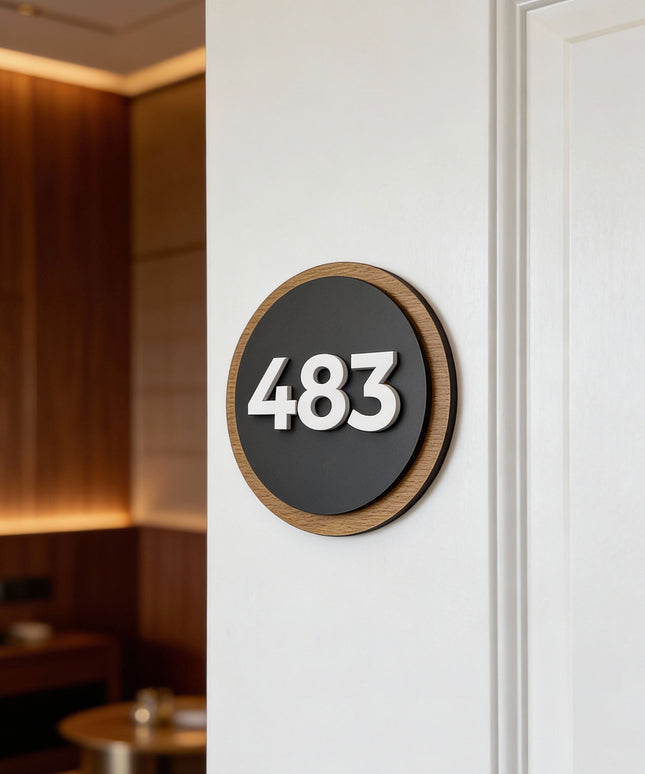 ALUMADESIGNCO Round Design wood and acrylic room number sign with natural birch plywood base and black acrylic numbers, modern Scandinavian hotel and apartment door number plaque