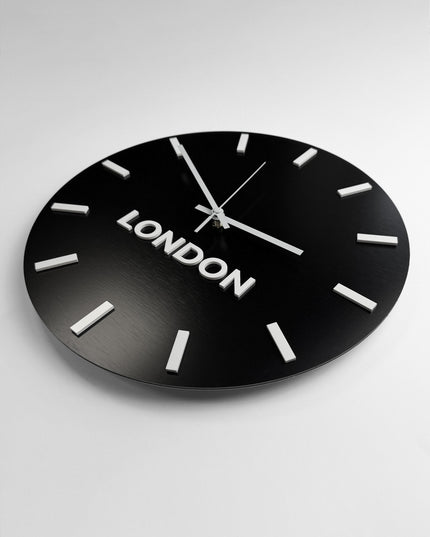ALUMADESIGNCO brushed black world clock with white acrylic glass and custom city labels, premium time zone wall décor for offices, hotels, conference rooms, and business interiors