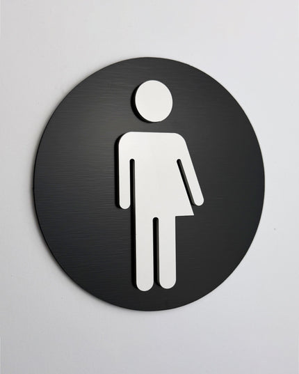 ALUMADESIGNCO unisex bathroom sign with modern inclusive pictogram, premium restroom door signage for offices, hotels, cafés, and commercial interiors