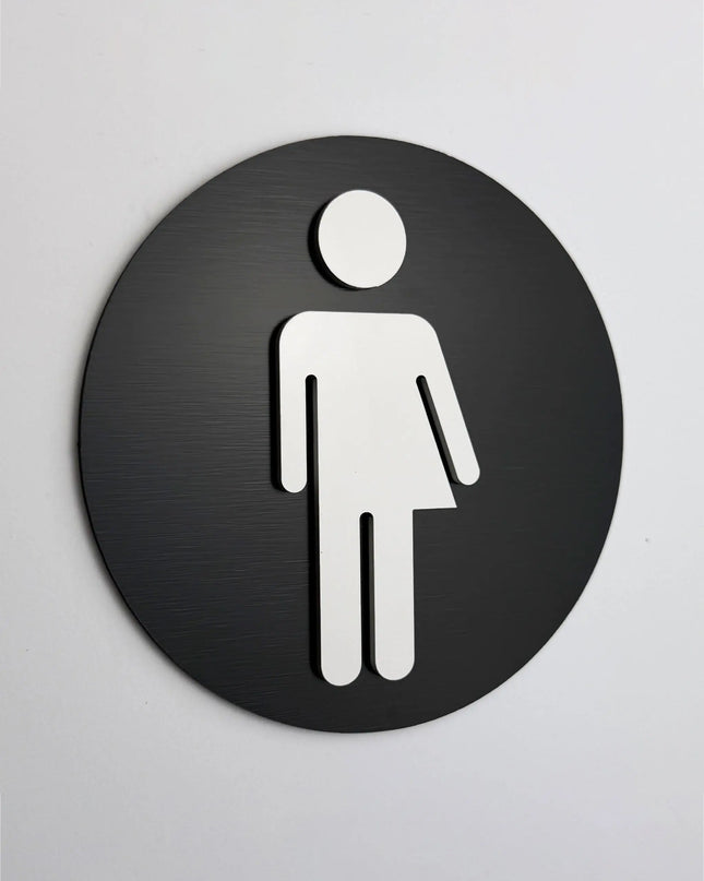 ALUMADESIGNCO unisex bathroom sign with modern inclusive pictogram, premium restroom door signage for offices, hotels, cafés, and commercial interiors