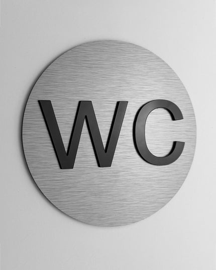 ALUMADESIGNCO WC sign with minimalist modern style, restroom signage for offices, hotels, cafés, and contemporary interiors