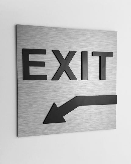ALUMADESIGNCO exit sign with down left arrow and minimalist modern style, wayfinding signage for offices, hotels, apartments, and contemporary interiors