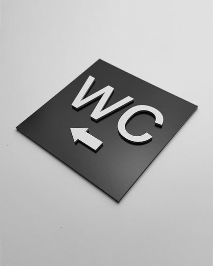 WC left only sign by ALUMADESIGNCO, stylish toilet direction plaque for hotels, offices, restaurants, and public interior spaces
