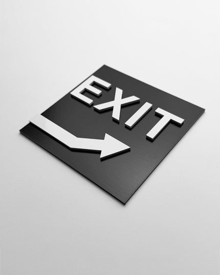 Modern exit arrow sign upstairs by ALUMADESIGNCO featuring clean directional style, elegant interior signage for hotels, cafés, offices, and public interiors