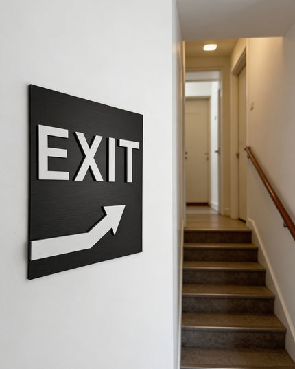 ALUMADESIGNCO exit signage with upstairs arrow and minimalist modern style, wayfinding signage for offices, hotels, apartments, and contemporary interiors