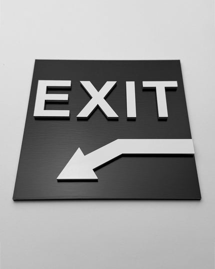 Exit arrow sign down left by ALUMADESIGNCO, stylish directional plaque for corridors, offices, hotels, and public interior spaces