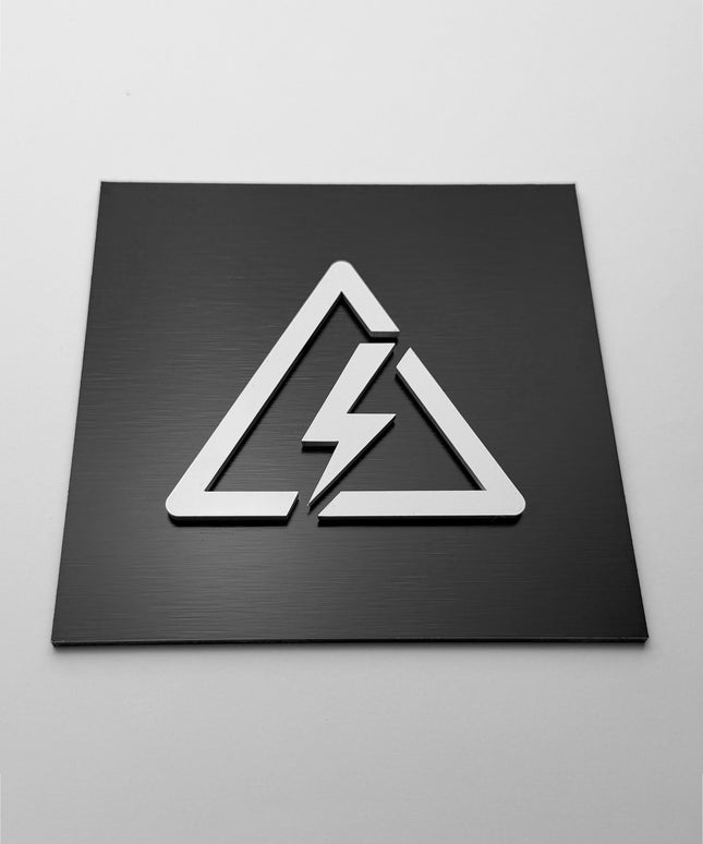 Electrical hazard sign by ALUMADESIGNCO, clear warning plaque for utility rooms, maintenance areas, offices, and industrial interior spaces